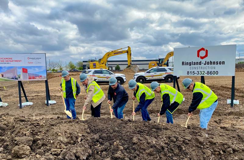 Retired members of the Sycamore Fire Department stick shovels in the land that will in about nine months be home to a new fire station. City officials held a groundbreaking ceremony for the city's new fire station on Monday, May 5, 2025, at 1351 S. Prairie Drive, Sycamore.