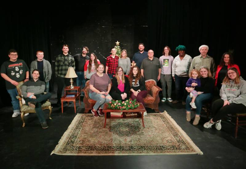 The cast of "Home for the Holidays" poses for a photo at Stage 212 in La Salle.