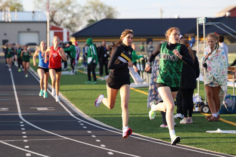 Herscher's Kelly O'Connor finishes the first lap during the 800-meter race at the Herscher Track Invite on Friday, May 1, 2026.