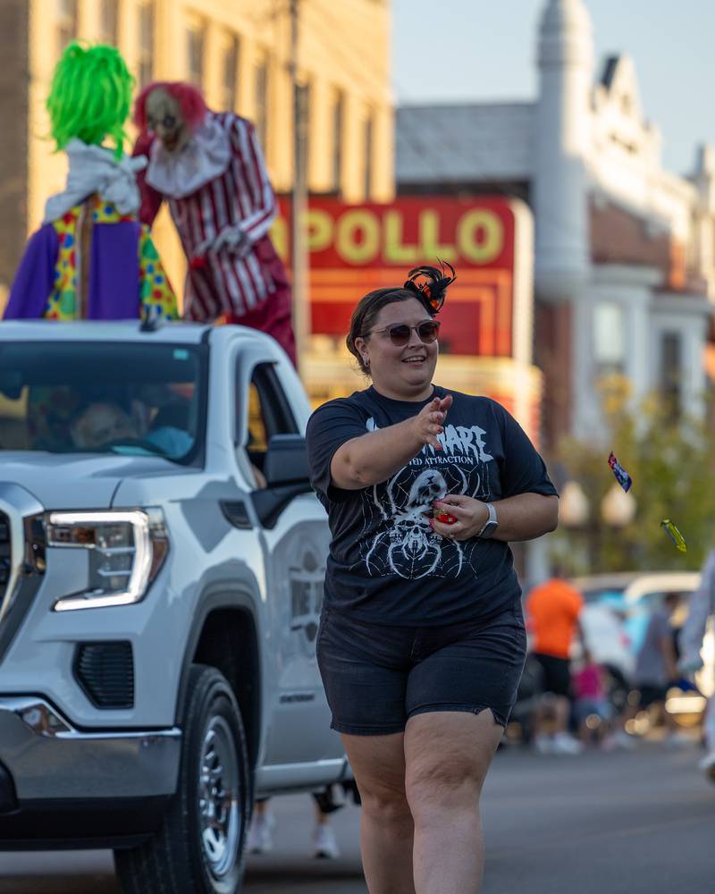 Jessica Burrows throws candy to kids at the annual Princeton Halloween Parade on Saturday, Oct. 4, 2025 on Main Street in Princeton.