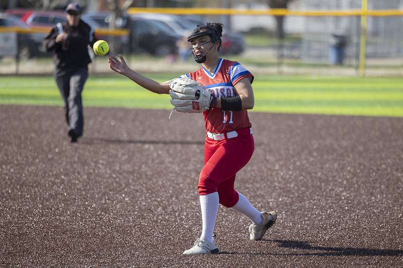 Morrison’s Kiyah Wolber throws to first for an out against Sterling Wednesday, April 26, 2023.