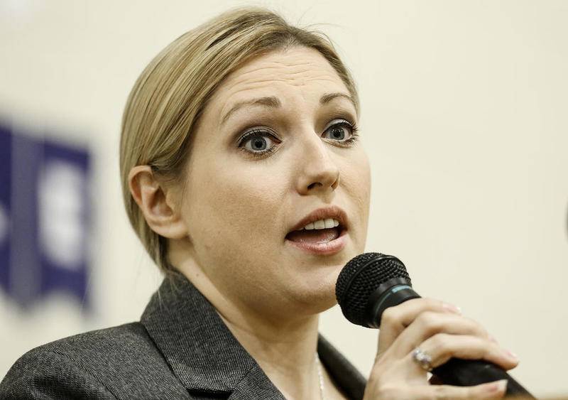 Rachel Ventura, candidate for District 9, speaks to a crowd of voters Thursday, Sept. 27, 2018, during candidate forum at Mt. Olive Missionary Baptist Church in Joliet, Ill.
