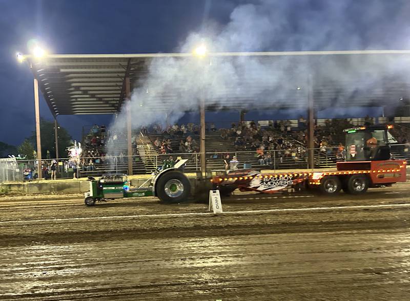 Austin Dornbush of Albany drives Time Maker, a 2021 modified entry, in the 650 open division of the Illini Truck & Tractor Pulls at the Ogle County Fair on Thursday, Aug. 1, 2024.