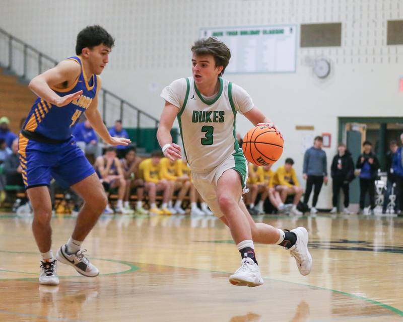 York's Connor Fitzgerald (3) drives to the basket during their basketball game between Lyons at York. Jan 10, 2025 in Elmhurst.
