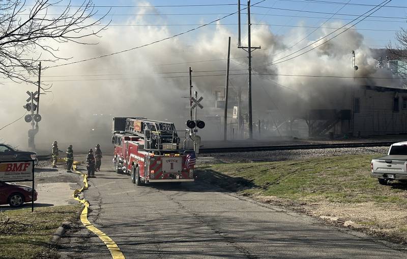 Ottawa firefighters arrive to the scene of fire at the former Platform 31 tavern on Monday, March 24, 2025 on Water Street in Peru. The fire was upgraded to a three-alarm summing ire departments from La Salle, Utica, Mendota, Tonica, Ottawa, Ladd, Spring Valley, Lostant, Cedar Point, Troy Grove and Peru responded to the fire.