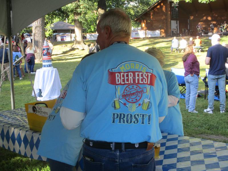 A volunteer at the Morris Beer Festival helps keep the beer flowing on Saturday. Sept. 6, 2025