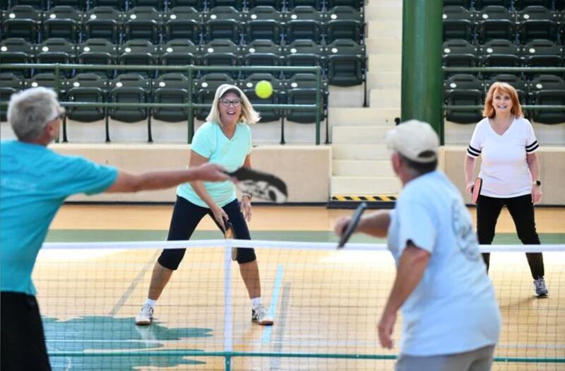 Kankakee Valley Park District transformed some indoor basketball courts into temporary pickleball courts for a holiday game session, in this file photograph. The Bradley village administration has been approached about creating a permanent pickleball courts, potentially within space in the Northfield Square mall.