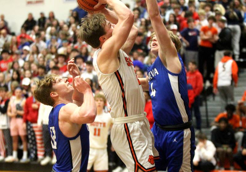 Wheaton Warrenville South’s Jake Vozza shoots the ball during a game against Geneva in Wheaton on Friday, Jan. 27, 2023.