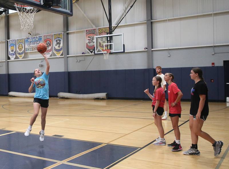 Girls run drills during the Fellowship of Christian Athletes Basketball Camp on Tuesday, July 8, 2025 at Brueau Valley High School.