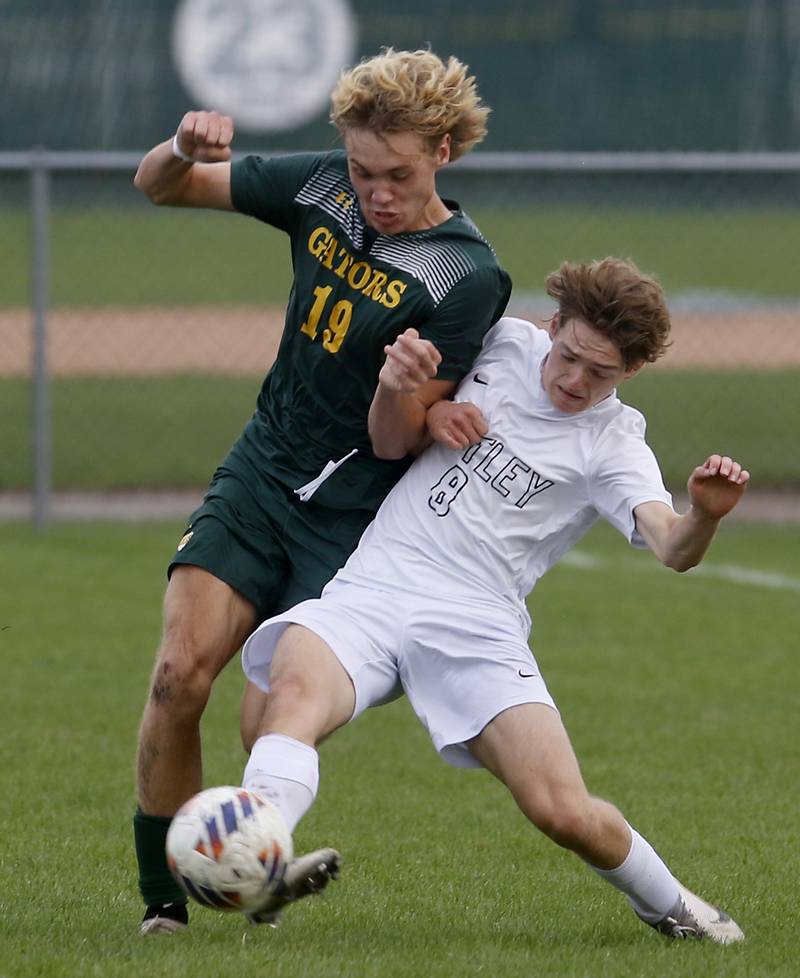 Huntley's Gavin Eagan (right) kicks the ball away from Crystal Lake South's Mason Ross during a Fox Valley Conference soccer match on Thursday, Sept. 28, 2023, at Crystal Lake South High School.
