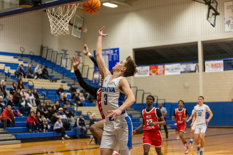 Geneva's Nathan Palmer goes in for the layup against West Aurora on Monday, Jan. 19,2026 in Geneva.