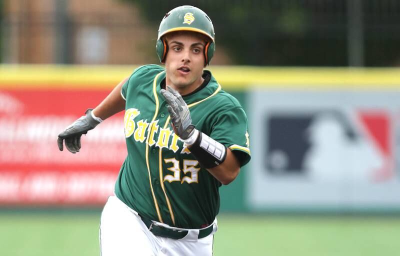 Crystal Lake South's Ysen Useni heads to third with a triple Friday, June 10, 2022, during their IHSA Class 3A state semifinal game against Nazareth at Duly Health and Care Field in Joliet.