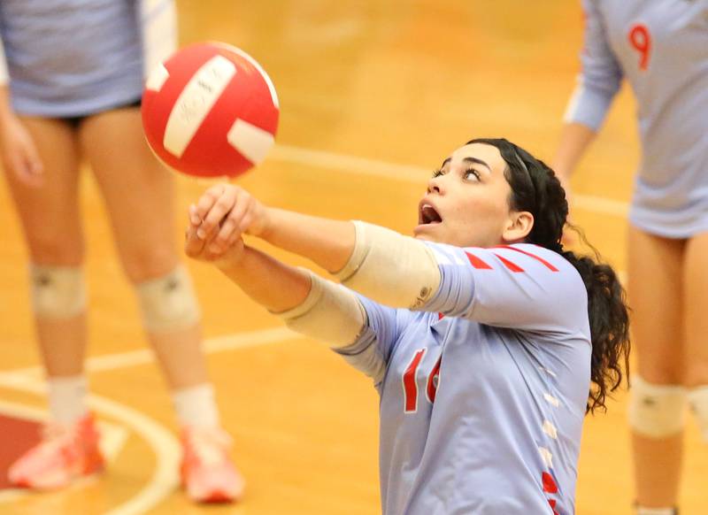 Ottawa's Cheyenne Joachim returns a serve from Sycamore on Thursday, Oct. 12, 2023, at Kingman Gym.