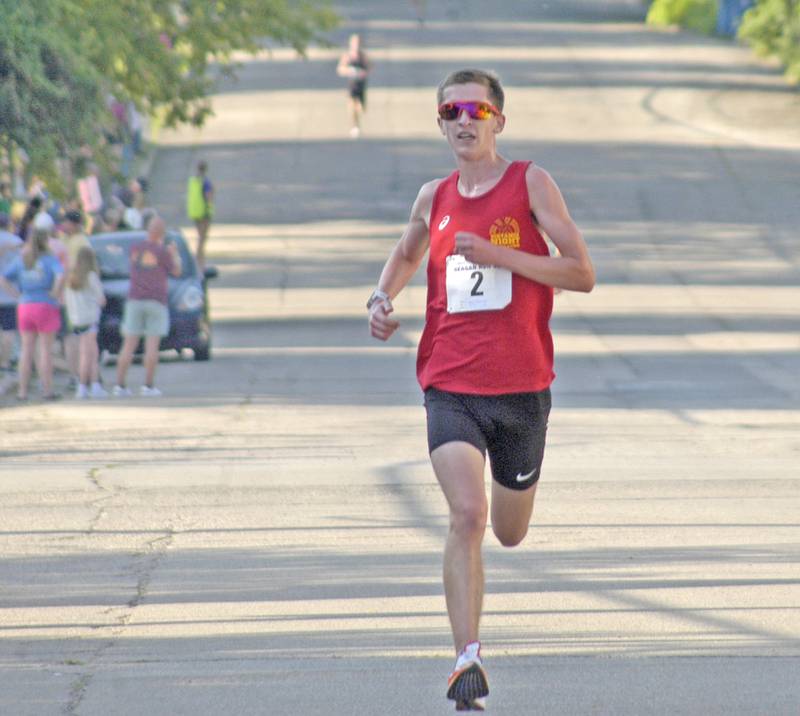 Aaron Conderman of Dixon wins the 2025 Reagan Run 5K with a time of 16:17.14. The Reagan Run was held Saturday, July 5, 2025, and was a highlight of the 61st annual Dixon Petunia Fest.