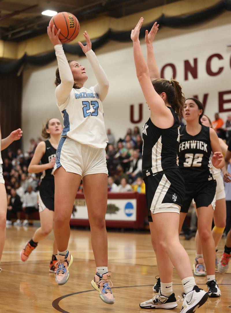 Nazareth's Danielle Scully (23) puts up a shot during the girls 3A varsity super-sectional game between Nazareth Academy and Fenwick High School in River Forest on Monday, Feb. 27, 2023.