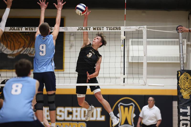 Joliet West’s Nate Fleischauer goes for the kill against Plainfield South in the Joliet West Regional Quarterfinals on Monday, May 22, 2023, in Joliet.