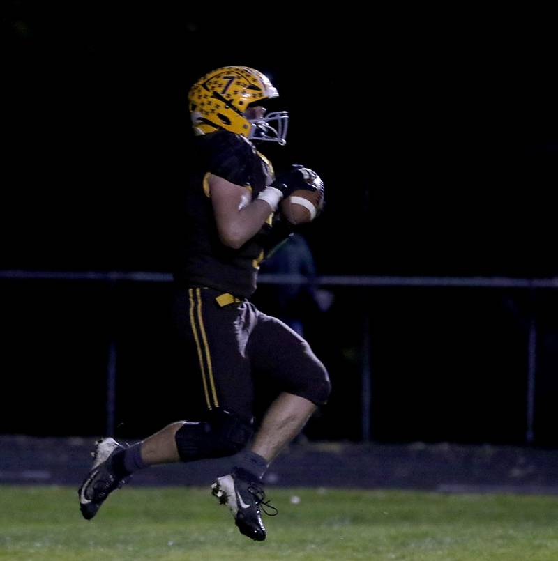 Jacobs' Jack Coates catches a touchdown pass during a Fox Valley Conference football game against Cary-Grove on Friday, Oct. 24, 2025, at Jacobs High School in Algonquin.