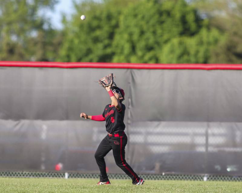 Yorkville's Nick Parashis (5) catches a fly ball during baseball game between Oswego at Yorkville. Thursday, May 8, 2025 in Yorkville.