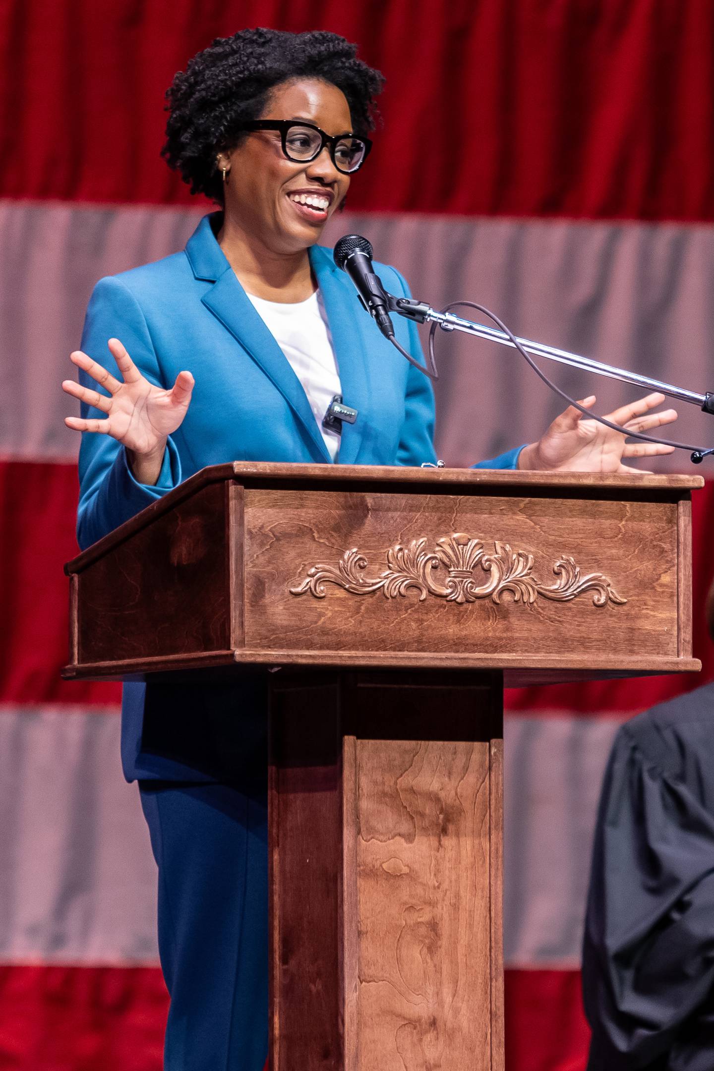 U.S. Congresswoman Lauren Underwood shares congratulatory remarks during the Naturalization Ceremony at Rialto Square Theatre in Joliet on April 17, 2025.