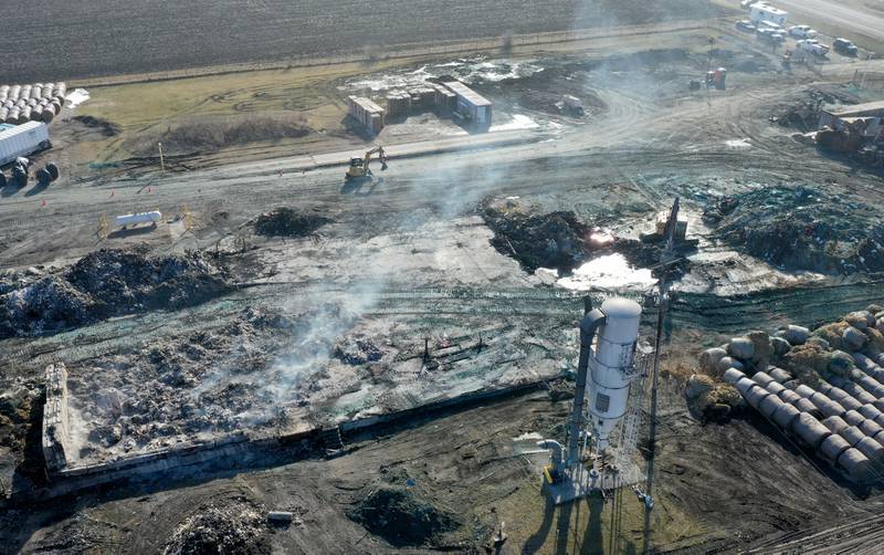 Excavators move ash and debris at LSC Environmental Products (formally Phoenix Paper Products) on Monday, Feb. 5, 2024 near Lostant. This comes two-weeks after a massive three-alarm fire destroyed the business. Lostant Fire Department has been out to the site several times since the fire for rekindles.