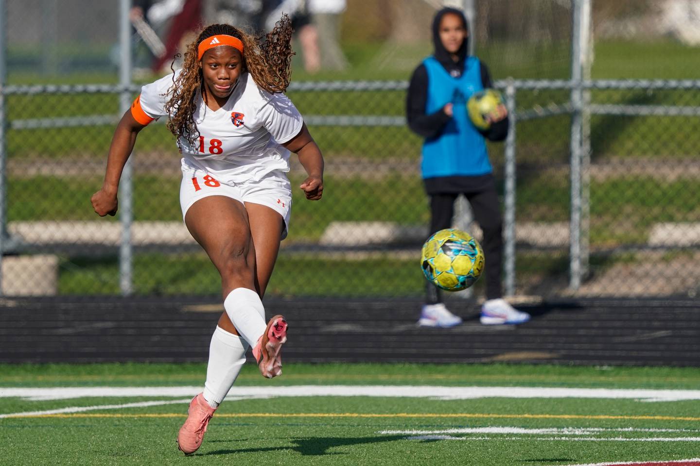 Oswego’s Jordyn Washington (18) takes a shot against Bartlett during a soccer mach in the Plainfield Classic  at Plainfield North High School on Tuesday, April 15, 2025.