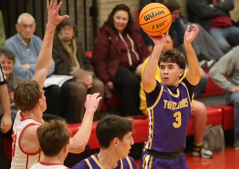 Mendota's Cam Kelly lets go of a shot against Ottawa on Tuesday, Jan. 7, 2025 in Kingman Gym at Ottawa High School.