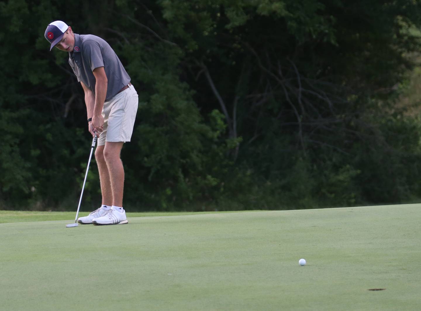 Bryer Harris puts during the Illinois Valley Mens Golf Championship Tournament on Sunday, July 27, 2025 at Spring Creek Golf Course in Spring Valley.