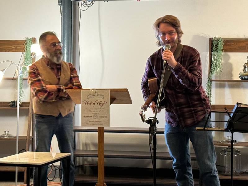 Joe Cavillo (from left) and Jon Glienke at a Paladins of Poetry event in Crystal Lake.