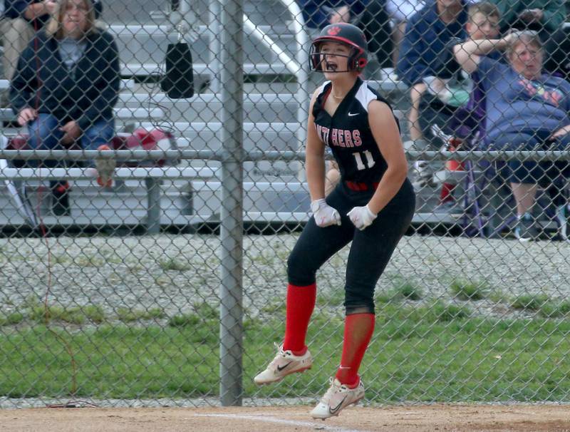 Erie-Prophetstown's Lilly Swatos reacts after scoring a run against Bureau Valley during the Class 1A Regional game on Monday, May 13, 2024 at Bureau Valley High School.