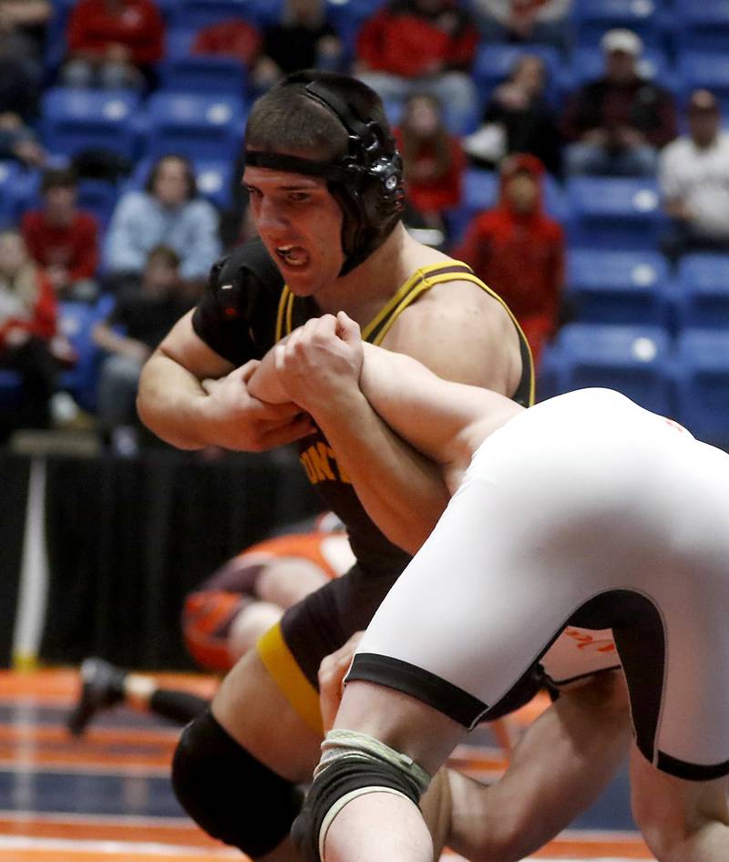 Montini's Santino Tenuta tries to take down Washington’s Cael Miller during the IHSA Class 2A Dual Team Sate Championship match Saturday, Feb. 24, 2024 at Grossinger Motors Arena in Bloomington.