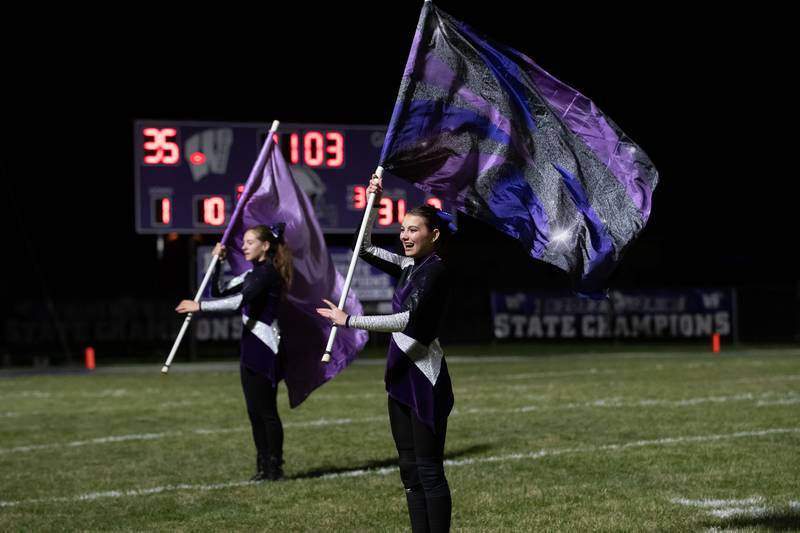 Wilmington's color guard performs during halftime at the Wildcats' 49-7 victory over Tri-Valley in the quarterfinal game on Saturday, Nov. 15, 2025.