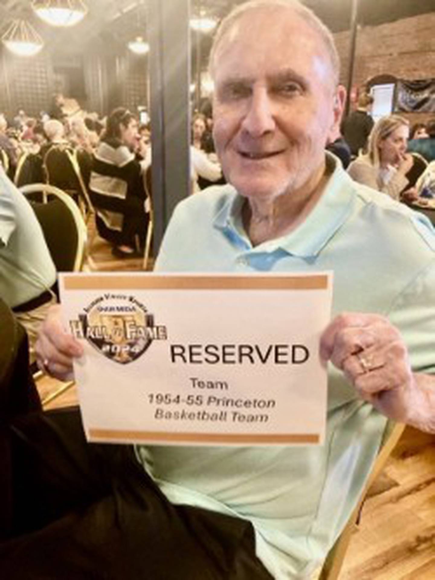 John Smith, who was a sophomore, represented his former teammates from the 1954-55 Princeton Tiger basketball team at this year's Illinois Valley Hall of Fame. He came back to teach math and coach at his alma mater. He passed away Monday at the age of 85.