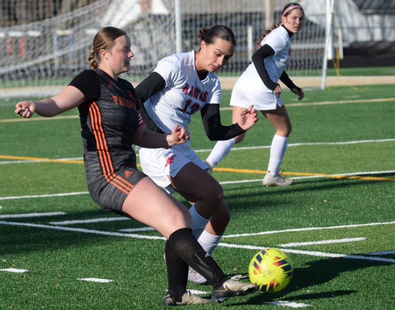 Oregon's Sarah Eckardt (13) battles a Freeport player for the ball during a Monday, March 31, 2025 game at Freeport High School.
