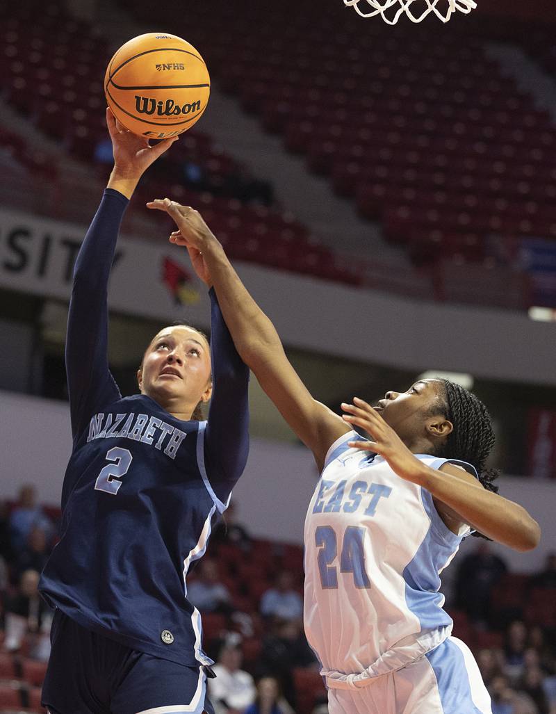 Nazareth's Samantha Austin puts up a shot against Belleville East’s Ramiyah Young Friday, March 6, 2026, in the Class 4A girls state semifinal game at CEFCU Arena at ISU.