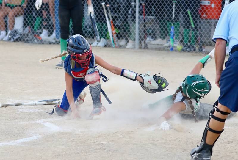 Princeton Logan catcher Kiyrra Morris makes a swipe tag in Thursday's season opener.