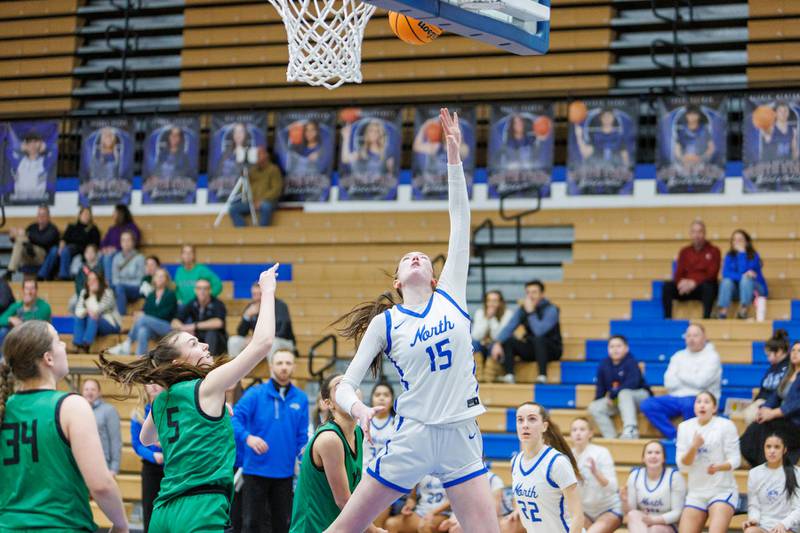 St. Charles North's Bronwyn How goes in for the layup against York at the Class 4A Regional Final on Thursday, Feb.19,2026 in St. Charles.