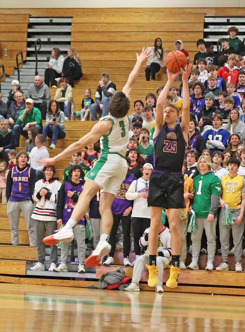 Downers Grove North’s Alex Miller (25) takes a three point shot against York during a boys varsity basketball game on Saturday, Feb. 10, 2024 in Elmhurst, IL.