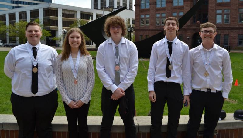 Five Oswego High School students earned medals at the recent SkillsUSA State Leadership and Skills Conference.