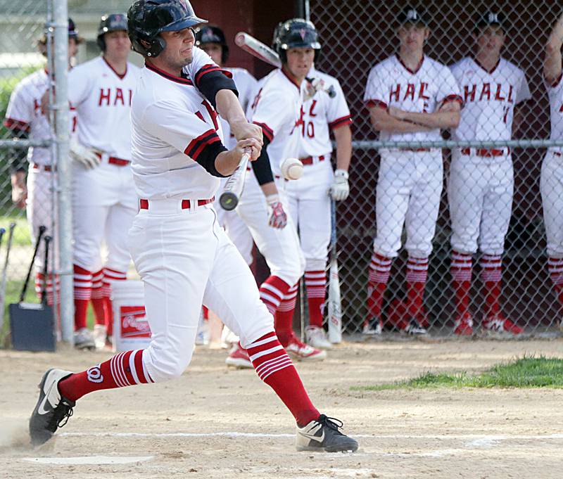 Hall's Trez Rybarczyk makes contact with the ball for a base hit.