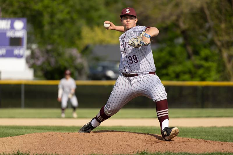 Richmond-Burton freshman Anthony Harvey delivers a pitch during Wednesday's game at Plano.