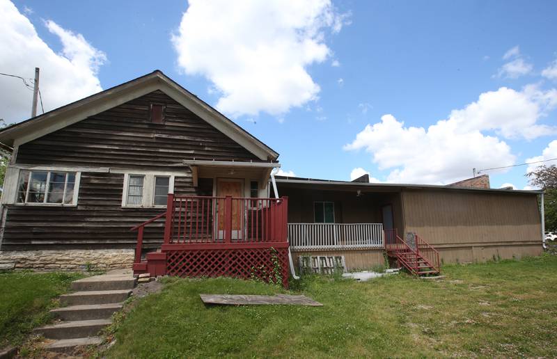 An exterior view at the Public Action to Deliver shelter on Tuesday, May 28, 2024, in Ottawa. The building was a mule barn at one time and is 155 years old. U.S. Rep. Lauren Underwood, D-Naperville, is seeking a $1.25 million grant for a new 11,000 square foot building in Ottawa.