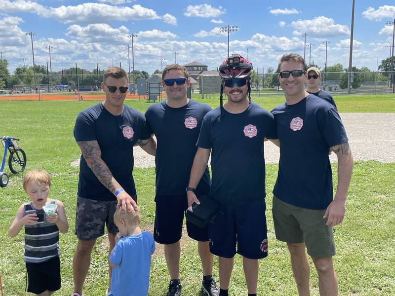 United Cerebral Palsy-Center for Disability Services in Joliet is hosting its third annual Great American Big Wheel Race on July 22 at Joliet Memorial Stadium. Pictured are members of the Joliet Fire Department team during a previous event.