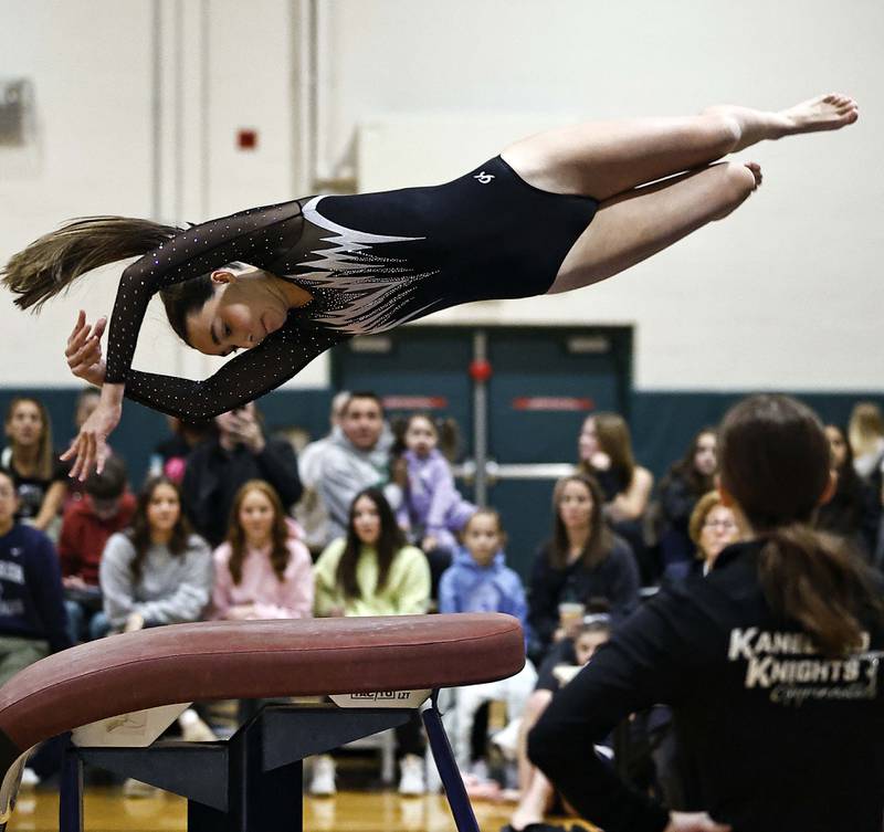 Kaneland’s Ella Kerrins on the vault during the Fremd girls gymnastics invite Saturday, Jan. 18, 2025 in Palatine.