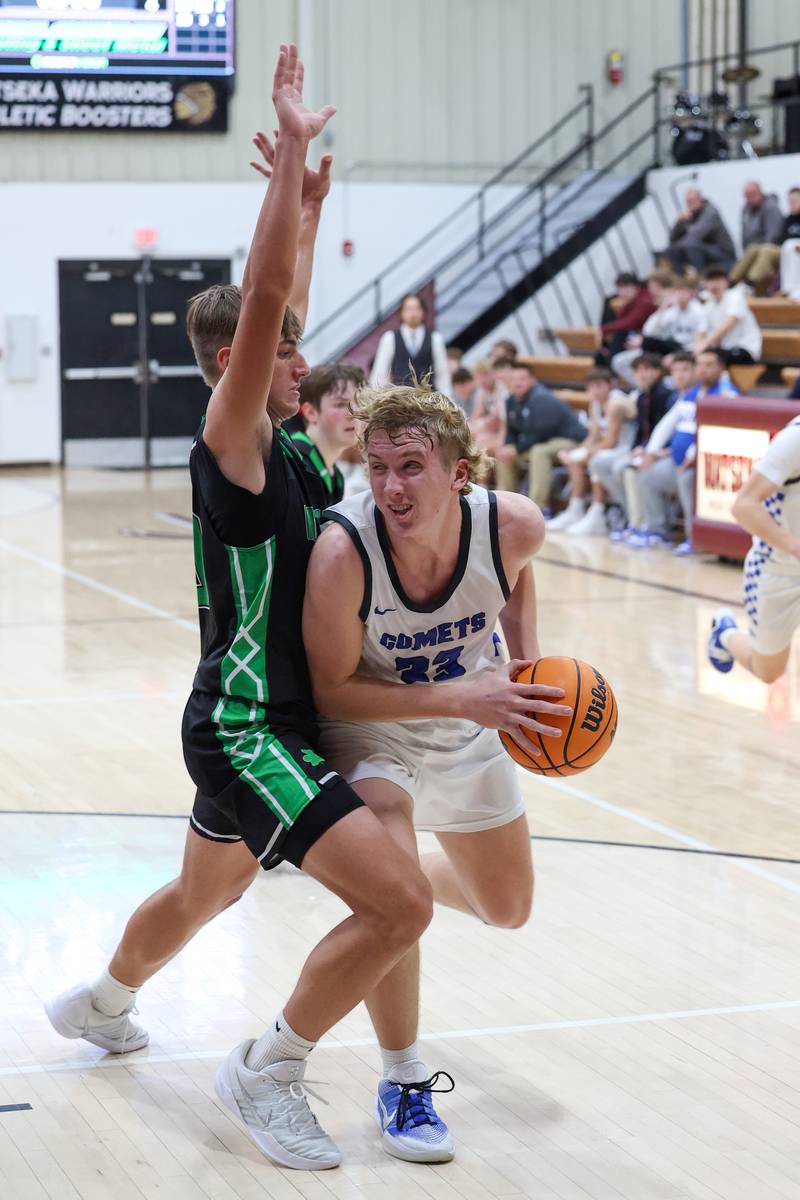 Clifton Central's Jake Thompson goes to the basket against Bishop McNamara's Coen Demack during the Fightin' Irish's 62-41 victory in the Watseka Holiday Tournament championship on Tuesday, Dec. 16, 2025.