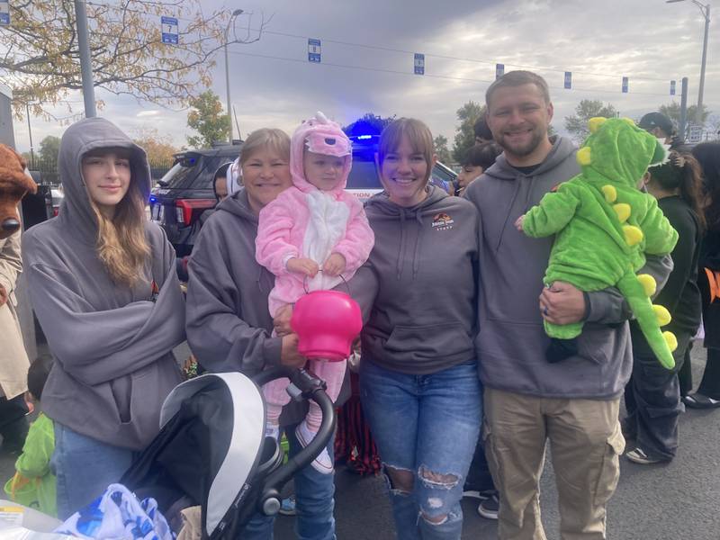 Joliet Police officer Tyler Thorstad and family trick-or-treat dressed as baby dinosaurs and Jurassic Park park rangers.
Saturday, Oct. 25, 2025.