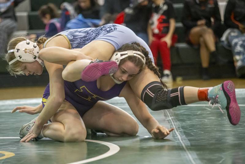 Grace Laird of Joliet Catholic High School wrestles Angelina Cassioppi of Hononegah Community High School earning her second place at sectionals in Geneseo on February 10, 2024.