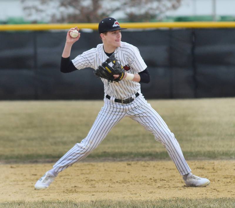 Fulton infielder Caden Wilkin gets ready to throw a Morrison runner out at first during a Friday, March 21, 2025 game in Fulton.