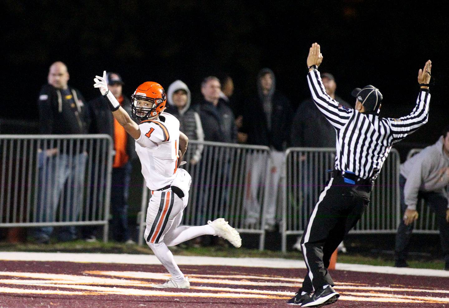 Wheaton Warrenville South's Reece Young scores a touchdown late in the fourth quarter during a Class 7A first-round playoff game against Brother Rice in Chicago on Saturday, Oct. 30, 2021.