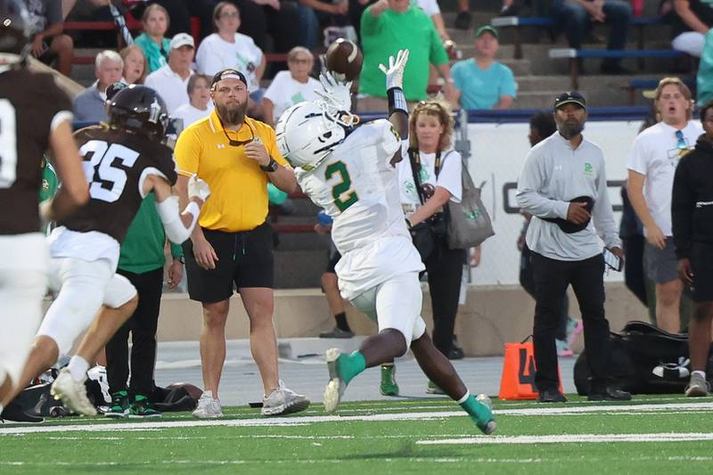 Providence’s Xavier Coleman pulls in the deep pass against Joliet Catholic on Friday, Sept. 1, 2023 Joliet Memorial Stadium.