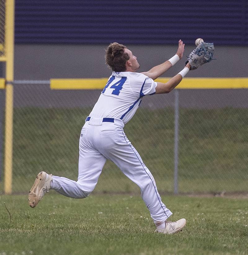 Newman’s Drake Cole chases down a foul ball but can’t haul it in against Marengo Wednesday, May 28, 2025, in the Class 2A Sectional semifinal in Mendota.